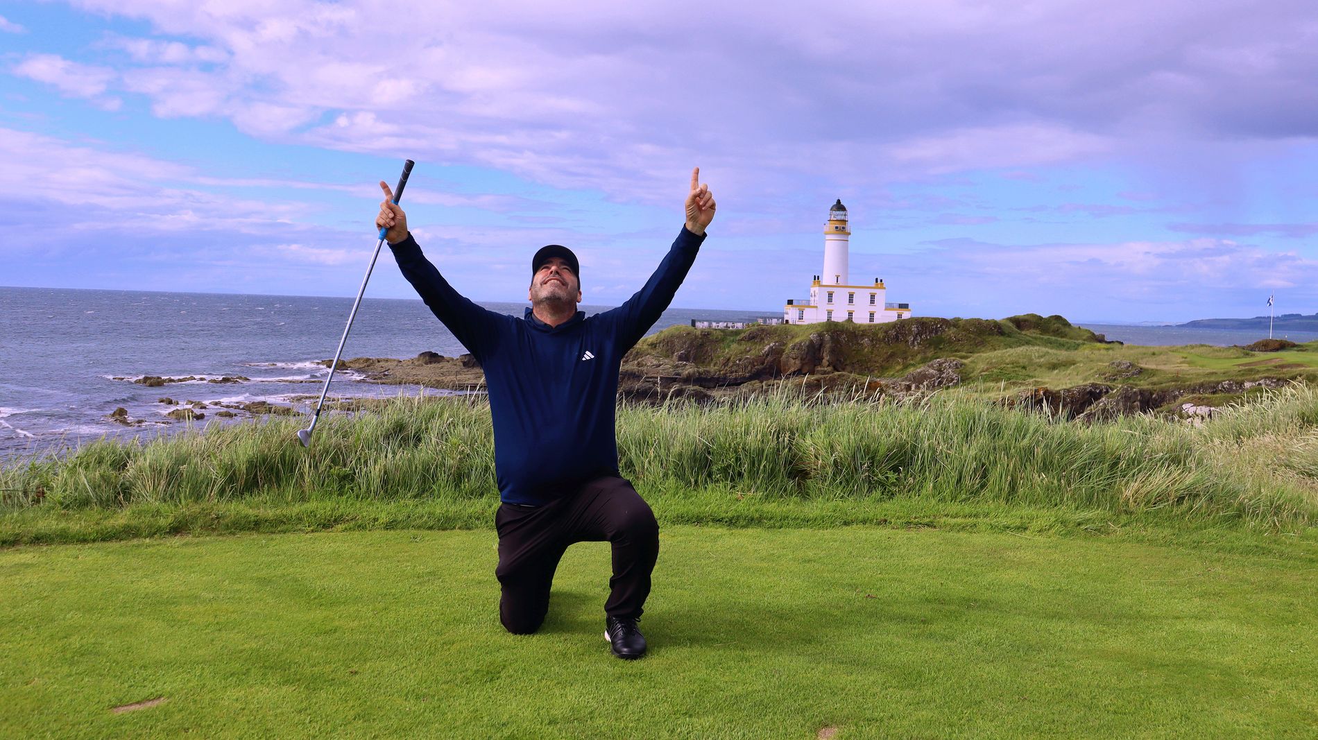 Celebraci&oacute;n frente al faro de Turnberry